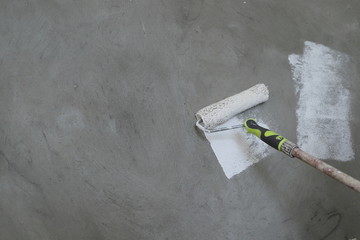 paint concrete walls in white with a roller, repair the apartment with your own hands modern interior