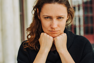Close up headshot portrait of a young caucasian woman with facial expression showing disappointment, anger, being insulted. Offensive woman concept - obrazy, fototapety, plakaty