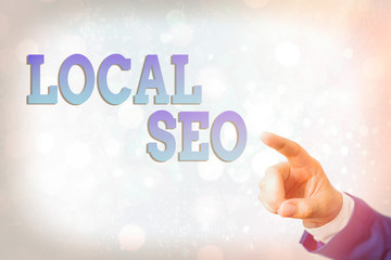 Writing note showing Local Seo. Business concept for helps businesses promote products and services to local customers