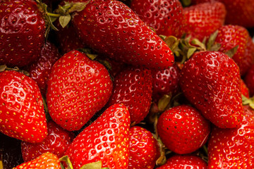 Close-up of fresh tasty strawberries. Ripe strawberry background