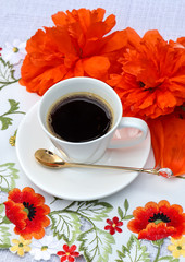 cup of coffee and flowers