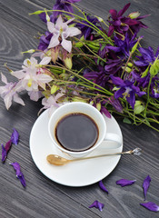 cup of coffee with flowers