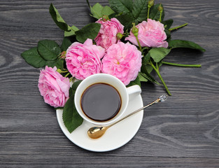 cup of coffee and rose