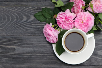 cup of coffee and rose
