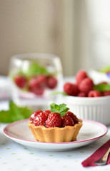 Fruit raspberry cakes on a table