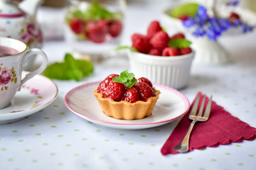 Fruit raspberry cakes on a table