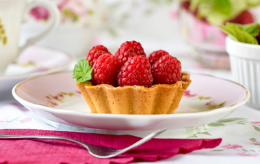 Fruit raspberry cake on a table
