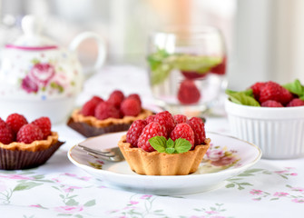 Fruit raspberry cakes on a table