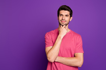 Photo of attractive handsome guy good mood arm on chin dreamer look interested empty space...