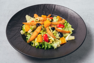 tasty salmon salad served on plate