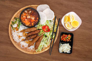 Vietnamese food Bun Nem Lui - chargrilled special minced pork-lemongrass-skewers, served with...