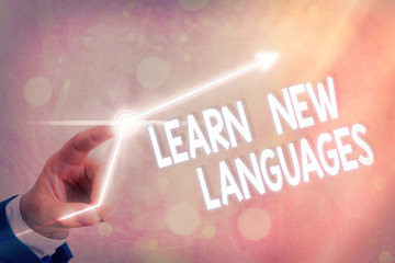 Text sign showing Learn New Languages. Business photo showcasing developing ability to communicate in foreign lang