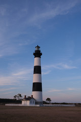 Bodie Island historic Lighthouse in the Cape Hatteras National Seashore at sunset, Outer Banks, North Carolina, USA