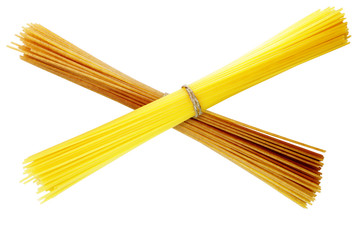 Durum wheat spaghetti. Isolated white background. Copy space for text. Close-up.