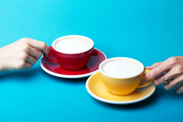 yellow and red cup on a blue background