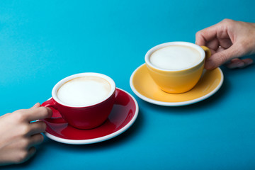 yellow and red cup on a blue background