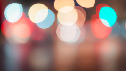 Abstract bokeh lights defocused on black background
