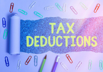Word writing text Tax Deductions. Business photo showcasing an amount or cost that subtracted from...