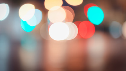 Abstract bokeh lights defocused on black background