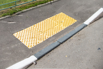 Braille Blocks in the pedestrian guiding the blinds walks. Traffic and urban life safety