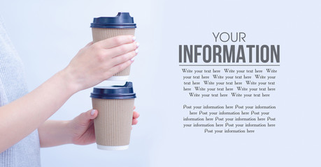 Woman holding two cardboard cups of coffee on gray background, take away concept, space for text