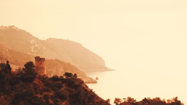 Mediterranean spanish coast landscape. Cliffs of Maro Cerro Gordo Natural Park with Pine tower, near Maro and Nerja, Malaga province, Costa Del Sol, Andalusia