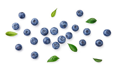 Fresh blueberries with bluberry leaves isolated on white background. Top vew.