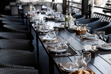 Festive table setting with empty wine glasses