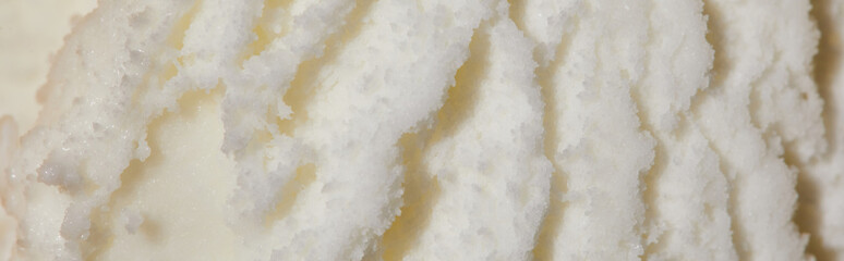 top view of fresh tasty ice cream ball with mint leaves and strawberry on yellow background