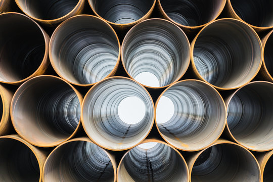 Abstract background of round metal pipes. Texture pattern.