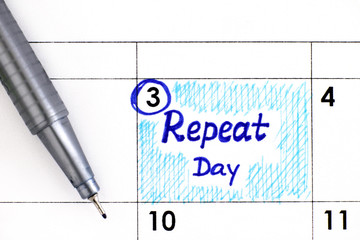 Reminder Repeat Day in calendar with pen.