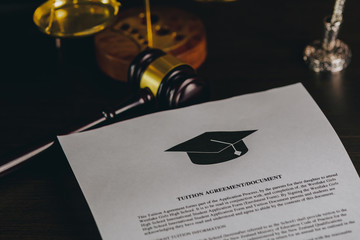 Man reading college or university application or document from school. College acceptance letter or...