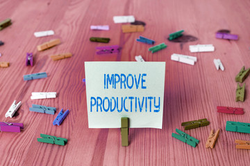 Conceptual hand writing showing Improve Productivity. Concept meaning to increase the machine and...