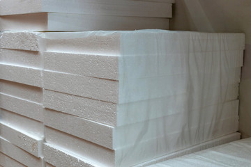 Stacks of polystyrene foam in packaging at a building materials warehouse in a store