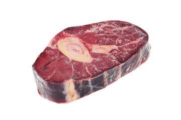 Obraz premium Raw beef steak osso buco with distinctive drawing on white background