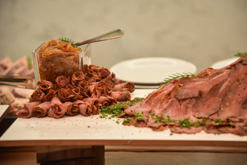 Sliced roast beef on a banquet table