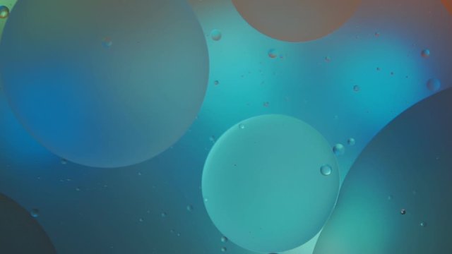 Abstract blue background. Mixing water and oil, beautiful blue abstract background based on blue circles and ovals, macro abstraction