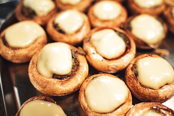 Grilled stuffed savory mushrooms with cheese