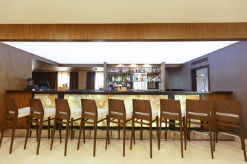 Interior concept. Design of bar with wooden chairs