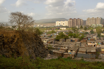 Fototapeta na wymiar view of the city with high rises and slums living side by side, disparity in wealthy and poor
