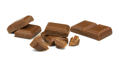 Broken milk chocolate bar on a white background