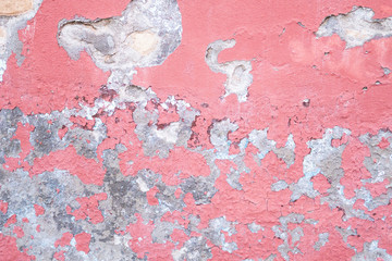 Concrete pink colorful wall surface texture. Abstract grunge bright color background with aging effect. Copyspace.