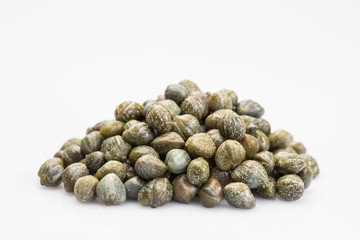 Capers isolated on a white background. Bunch canned pickled or salted capers.