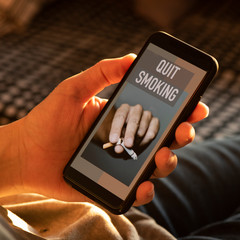 text quit smoking in a smartphone