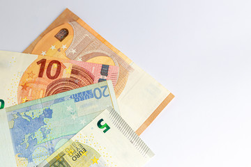 Banknotes on a white background. The concept of the global financial crisis. Suitable for puzzles and magnets.