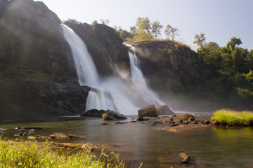 Athirappilly waterfall as seen from the top and bottom of the waterfall, it is a popular tourist place in Kerala and also featured in many movies as an exotic location.