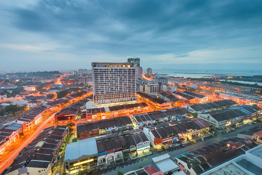 Melaka, Malaysia city skyline from above at dusk.