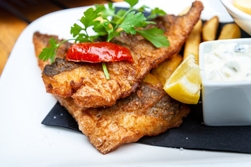 British Traditional fish and chips and tartar sauce