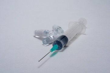 syringe with a needle. vaccine. on a white background close-up