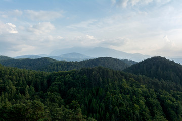 Fototapeta na wymiar Beautiful view of Carpatian Mountains from the top of Rasnov Citadel, Romania
